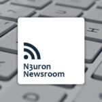 Picture showing a keyboard background with a white square containing the N3uron Newsroom logo.