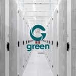 Interior of an advanced data center showcasing server racks and infrastructure with a central Green logo inside a hexagon.