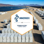 Innergex and Trekkor logos set on a white hexagon against a solar plant backdrop