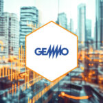 Gemmo S.p.A. logo set on a white hexagon against a city skyline backdrop